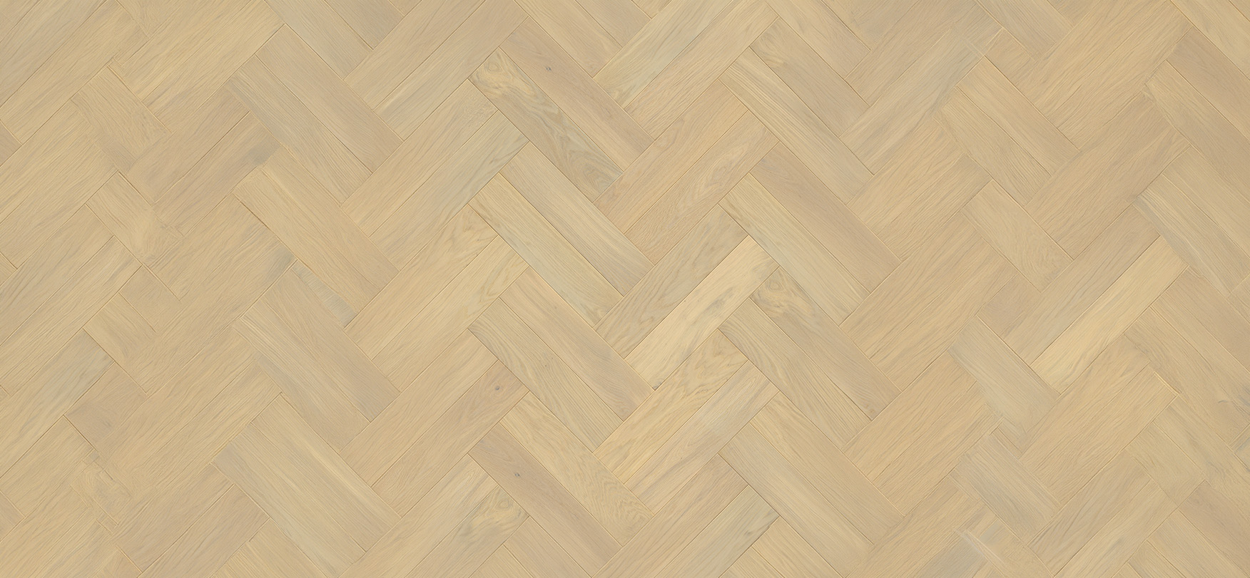 Light oak herringbone parquet flooring in a sophisticated interior