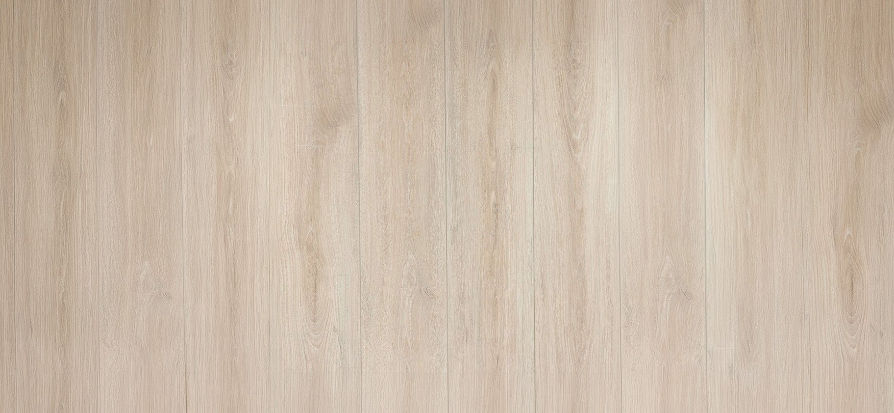 Modern whitewashed laminate flooring in a bright interior